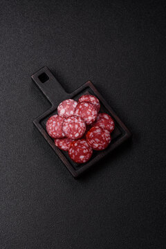 Slices of smoked salami for sandwiches or a lunch spread. Salami slices