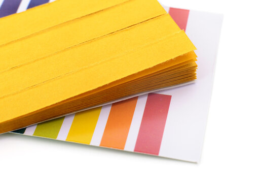 Universal pH indicator test paper strips isolated on white background
