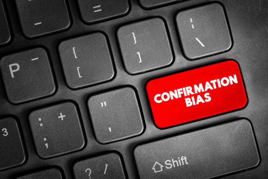 Confirmation bias text on a keyboard key, illustrating cognitive psychology concepts, selective thinking, decision errors, belief reinforcement, mental shortcuts