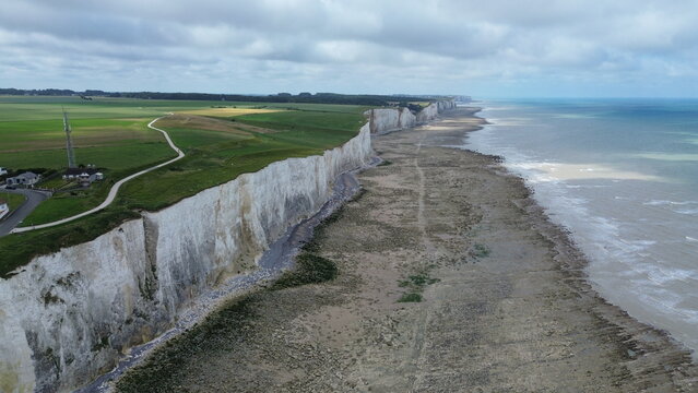 Panoramic aerial view of white chalk cliffs and Atlantic ocean coastline in Ault near Somme Bay, France