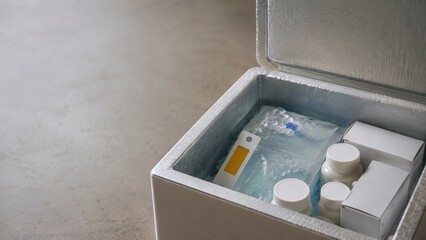 Fototapeta premium GLP-1 medication stored in insulated cold box, refrigerated weight management treatment for pharmaceutical delivery