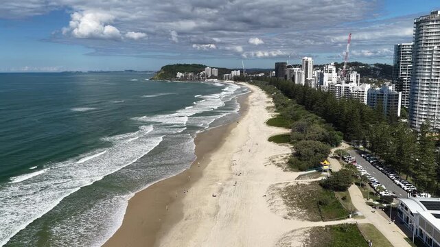 Aerial drone view of surf rolling onto Burleigh Heads beach, Gold Coast, Queensland Australia