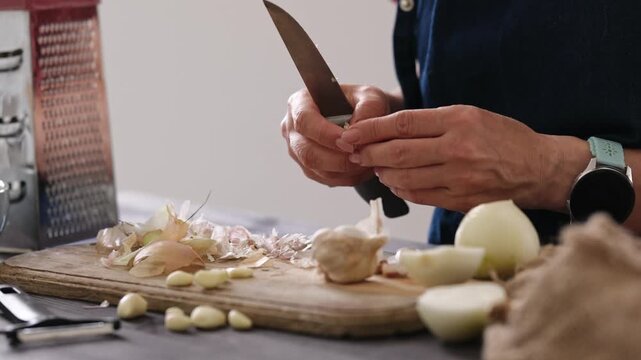 Close-Up Of A Woman Peeling Ginger