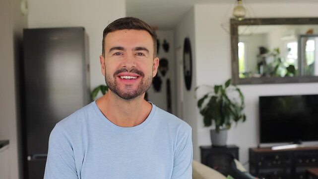 Handsome Man Licking Lips and Smiling Preparing for Photo Shoot