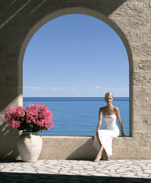 Elegant Woman in White Dress by the Greek Seaside &ndash; AI Generative &ndash; No Real Person
