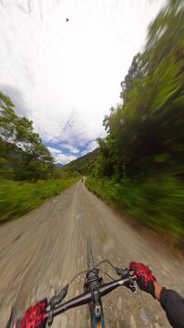Adventure Mountain Biker Riding on Death Road Gravel Path La Paz Bolivia