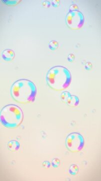 Rainbow pastel bubbles on light background. 2d animation