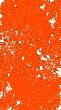 Abstract orange distressed grunge texture background with white marks and speckles