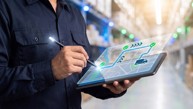 Delivery Route Tracking and Logistics Navigation Concept, worker using tablet with holographic city map showing truck, checkpoint markers and route arrows for supply chain distribution