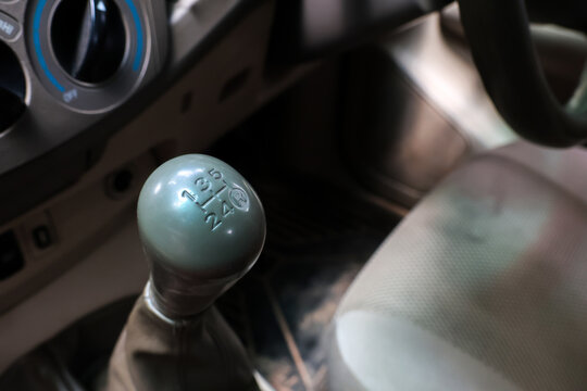 Manual transmission gear shift knob inside vehicle cabin