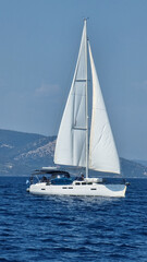 Fototapeta premium ship sailing blue sails sea greece summer