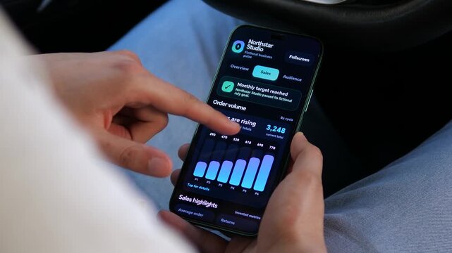User switches between sales and audience analytics on a smartphone, tracking revenue, orders and customer growth as mobile business intelligence drives faster decisions.