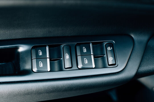 Window control buttons on the door