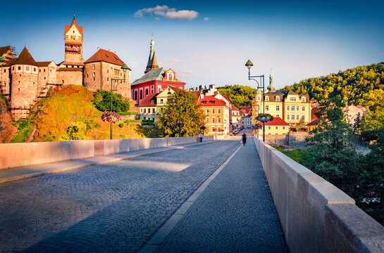Stunning summer wview of Church of St. Wenceslas and Loket Castle. Spectacular evening cityscape of Loket town, Sokolov District, Karlovy Vary Region, Czech Republic, Europe. 