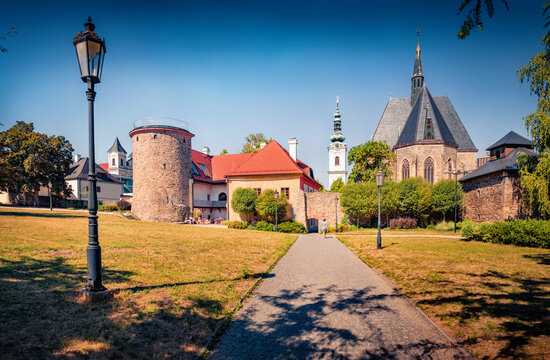 Impressive morning view of Klatovy city fortifications, White Tower and Church of the Nativity of the Virgin Mary. Amazing summer cityscape of Klatovy town, Plzen Region, Czech Republic, Europe. 