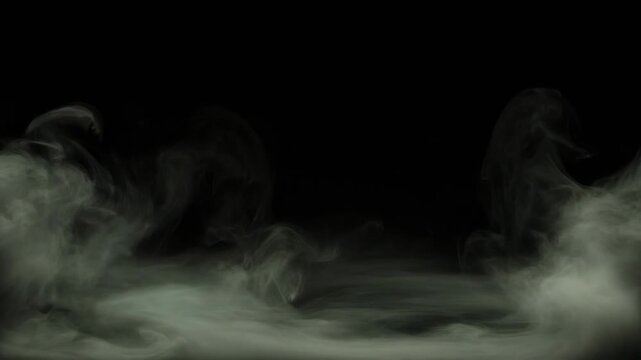 Dark smoke or mist swirling against a black background