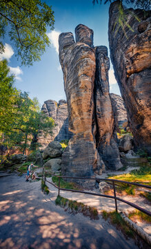 Amazing summer view of popular tourist attraction - Tiske steny, biking, hiking and rock climbing offered in a picturesque alpine region with sandstone formations, Tisa village, Czech Republic. 