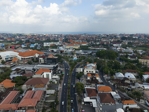 Aerial view of Statue of Dewa Ruci at the busy intersection in Kecamatan Kuta, Bali, Indonesia.