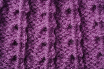 Fototapeta premium Purple knitted fabric with open stitch pattern background