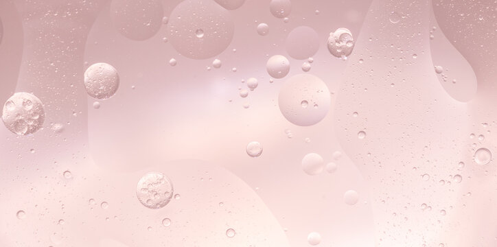 Abstract Pink water bubbles essential oil beauty collagen Serum Repair cell background.