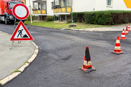 Newly Renovated Asphalt Road Surface at Construction Site &ndash; Fresh Pavement and Urban Infrastructure Repair