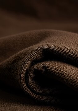 A luxurious close-up view of deeply textured, folded fabric showcasing exceptional comfort, warmth, and irresistible softness ,comfort ,surface ,material