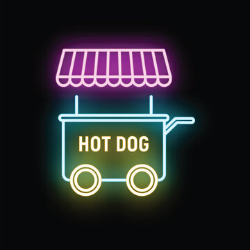 Hot dog cart illuminating with neon light, representing street food vending