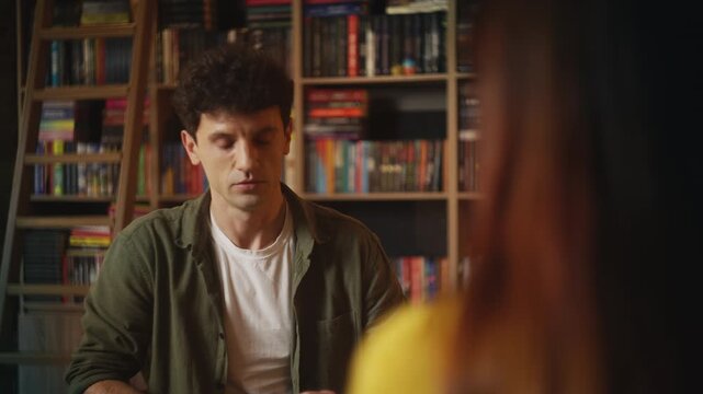Sad man talks with girlfriend about relationship crisis and possible breakup