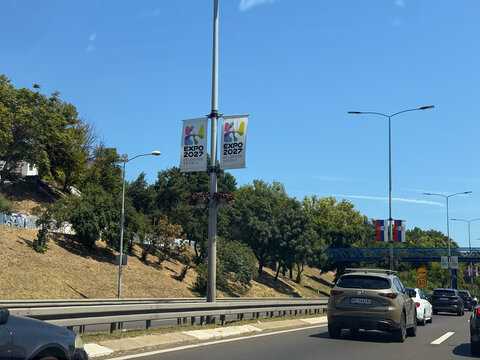 30 July 2026, Belgrade, Serbia: Expo 2027 banners line a busy Belgrade roadway beside cranes and renovation work as Serbia prepares for the international specialized exhibition.