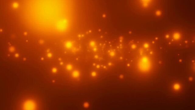 Glowing orange and yellow particles pulse and drift gently across a dark background with soft diffusion and blur effects. Smooth animated scene for visual effects and ambient scenes.