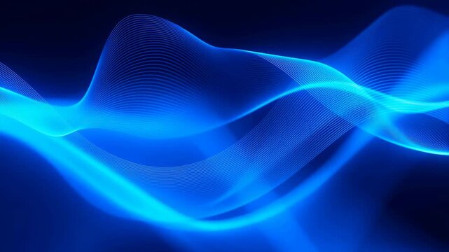 Blue glowing wave lines flow and undulate smoothly across a dark digital background with pulsing light effects. Flowing visual background for presentations and digital media.