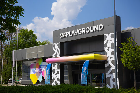 17 April 2026, Belgrade, Serbia: Expo 2027 playground signage on modern pavilion facade in Belgrade Serbia under blue sky. International exhibition branding