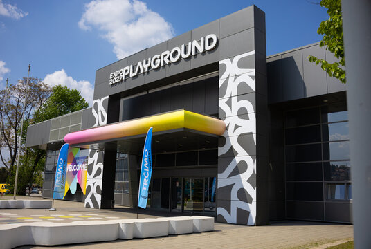 17 April 2026, Belgrade, Serbia: Expo 2027 playground signage on modern pavilion facade in Belgrade Serbia under blue sky. International exhibition branding