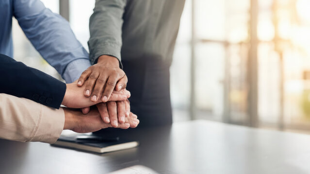 Teamwork collaboration unity support, diverse business people stacking hands together in office, showing trust and motivation