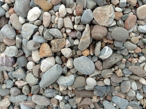 Natural river pebbles and srone texture background
