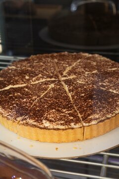 Large Cocoa Dusted Tart in Cafe Display Case