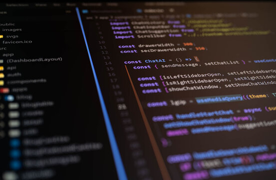 Software development screen showing colorful programming code for AI chat application, representing coding, web development, automation, artificial intelligence and modern software engineering.