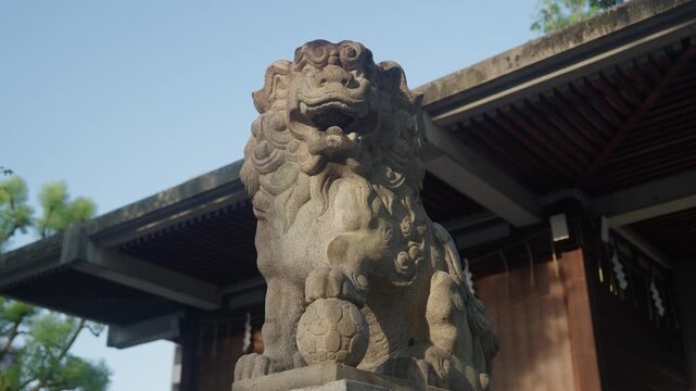 Low Angle View of Traditional Japanese Guardian Lion Statue