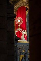 interior religious mural at the sacred-coeur basilica in Paris France with dim soft light on the interior of the cathedral church © STJMEDIA