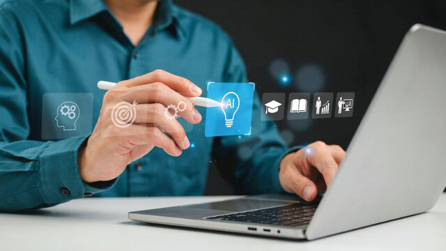 Person interacting with artificial intelligence digital icons on a laptop using a stylus for business and educational development