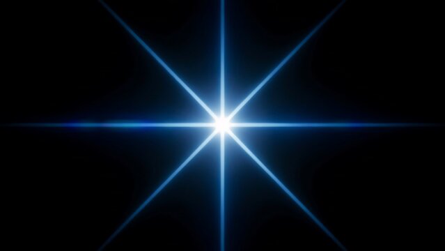 Bright blue star burst lens flare light effect on black background with illumination