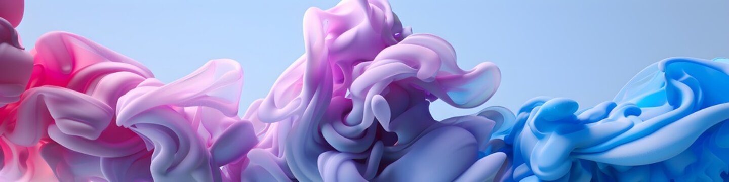 Vibrant liquid ink clouds swirl in elegant pastel pink and deep blue colors creating smooth dynamic shapes of artistic beauty