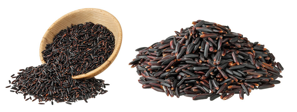 Black rice in wooden bowl isolated on white background with full depth of field