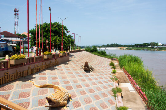 Carving crocodile and alligator sculpture represent local Thai folklore at Chao Pho Thepharak Chao Mae Thapthim Shrine in Pak Nam Pho for people travel visit on July 18, 2026 in Nakhon Sawan, Thailand