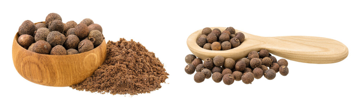 Allspice pepper and ground in wooden bowl and spoon isolated on white background. Jamaica pepper, Pimenta dioica or myrtle pepper
