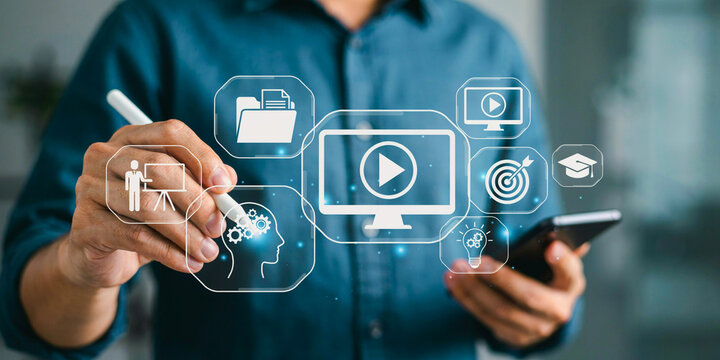 Person Using Digital Stylus to Interact with Holographic Online Education and Professional Development Interface Elements