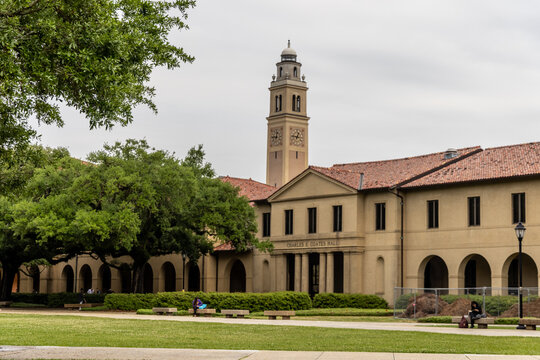 Baton Rouge, Louisiana, United States - 28 March 2023: View of Charles E. Coates Hall at Louisiana State University, with its clock tower, arched walkways, and green lawn.