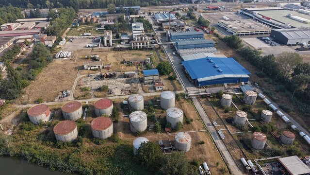 Aerial view of the oil refinery featuring industrial storage tanks, processing facilities, and surrounding infrastructure in Belgrade, City of Belgrade, Serbia.