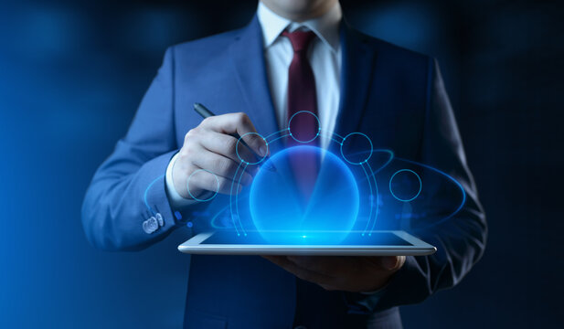 A businessman holds a tablet. Business Technology Concept
