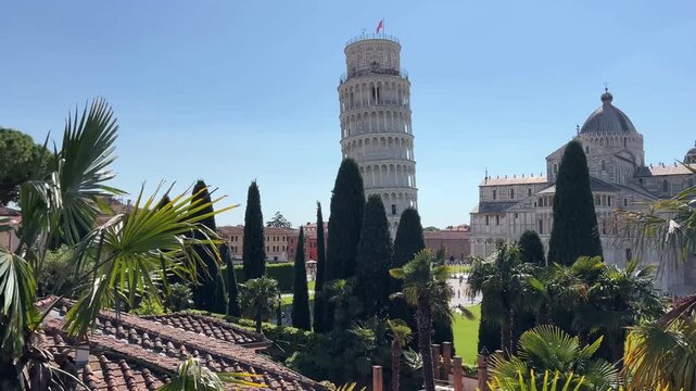 Leaning Tower of Pisa and Cathedral Piazza dei Miracoli,  from the medieval city walls on a sunny day panoramic view.
